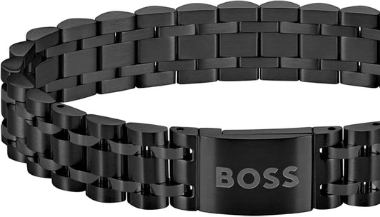 Black-steel cuff with magnetic logo closure